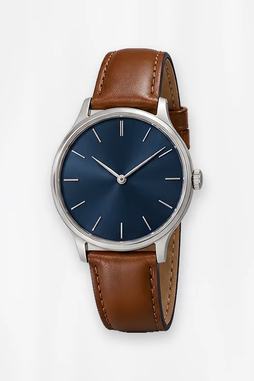 White-gold dress watch with a navy sunburst dial on a cognac calfskin strap